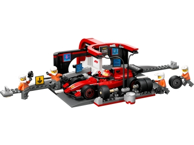 Boxa si mecanici F1 cu masina Ferrari